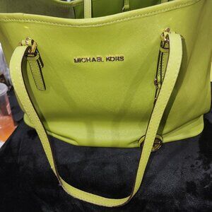 Michael Kors Jet Set Travel tote bag in lime Saffiano leather.